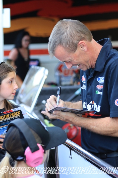 Clay Millican signs autographs.JPG