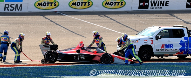 AMR assist Katherine Legge after spin.JPG