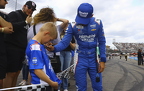 Kyle Larson and fan