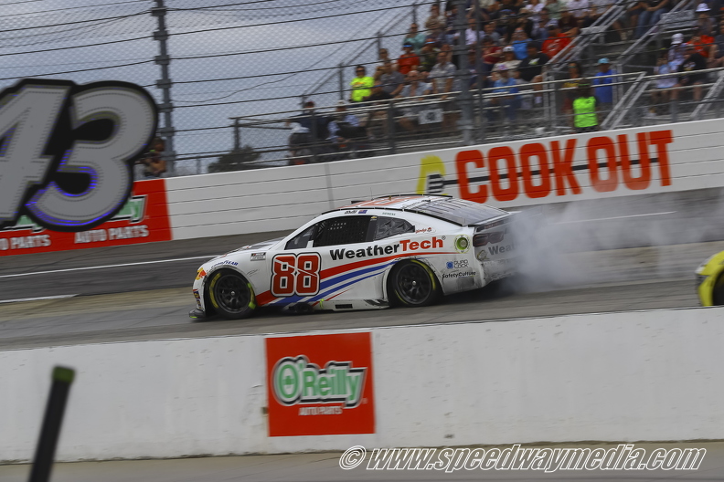 Shane Van Gisbergen spins after loosing a right rear wheel.jpg