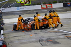 crew pushing Nick Sanchez behind the wall
