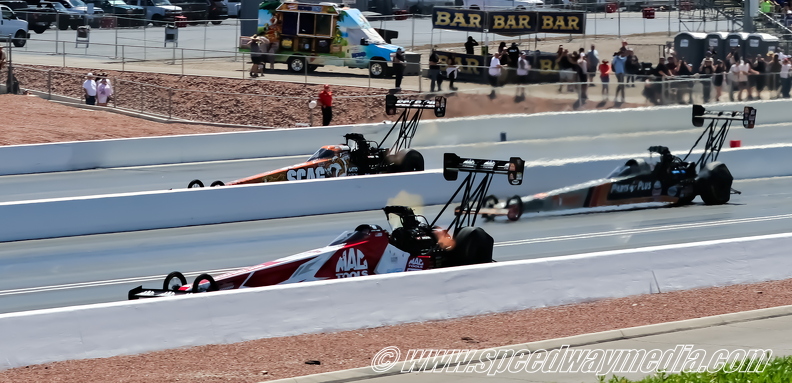 Antron Brown in the Mac Tools Top Fuel car.JPG
