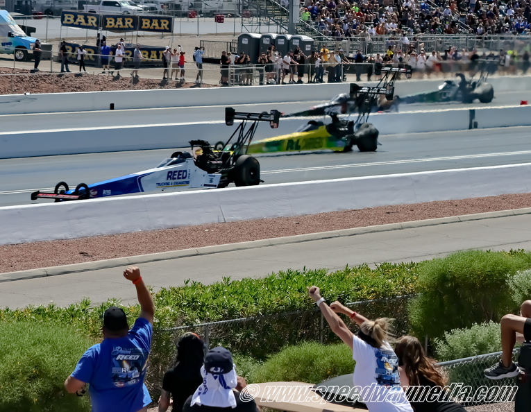 Shawn Reed fans cheer as he wins his go around.JPG