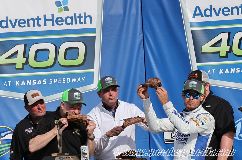 Kyle Larson with some KC BBQ in victory lane.JPG