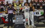 Christopher Bell with his wife celebrate