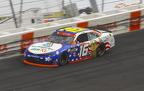 Christian Eckes running high in turn 3