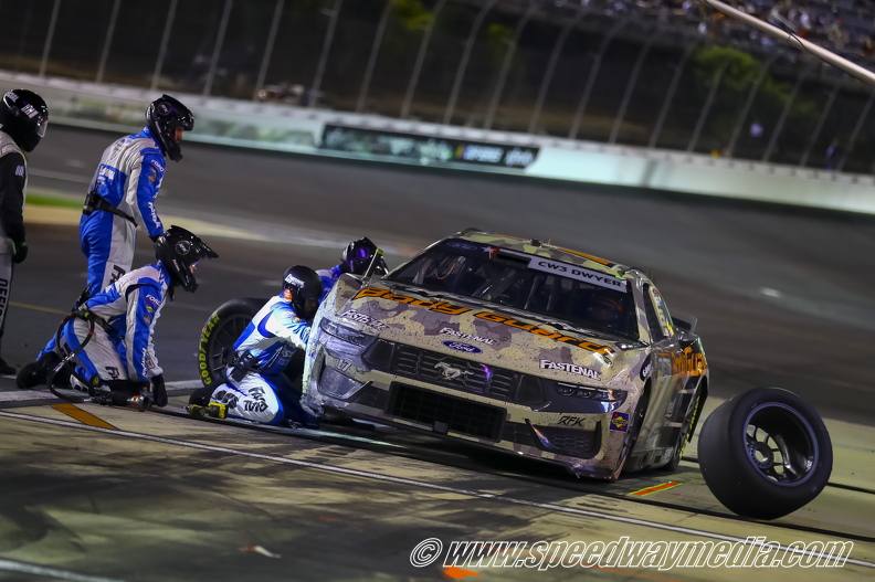 Chris Buescher getting tires.jpg