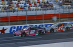 Austin Green leading Grant Enfinger down the front stretch