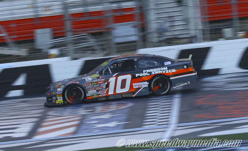 Tony Cosentino under the flag stand.jpg