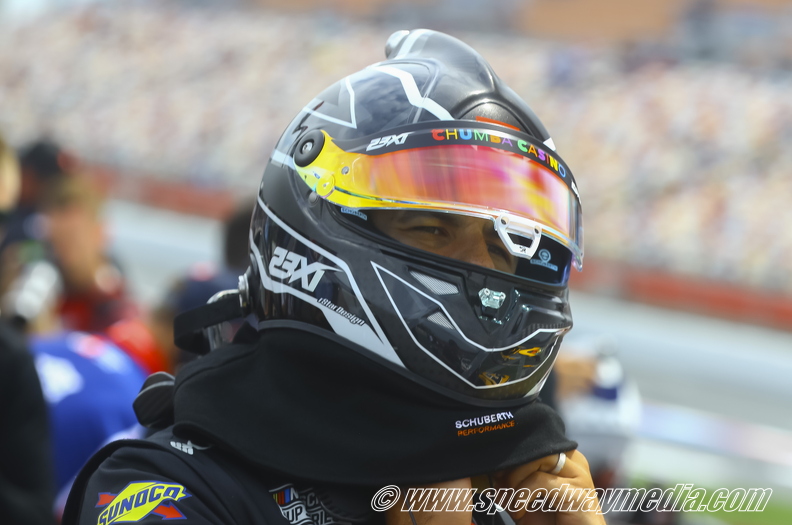 Bubba Wallace putting on his helmet.jpg