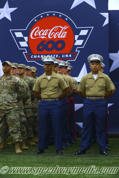 Marines in front of banner.jpg