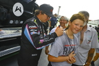 Sheldon Creed signing a fan's tee shirt