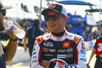 Christopher Bell talking with a crew member