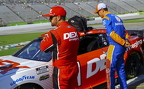 Joey Logano inspects Josh Berry's car