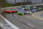 Out of turn two heading down the back stretch