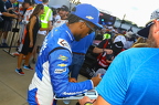 Rajah Caruth signing autographs