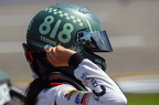 Toni  Breidinger putting helmet on