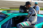 Chase Elliott getting into his car to qualify
