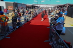 Fans line the red carpet waiting for the drivers