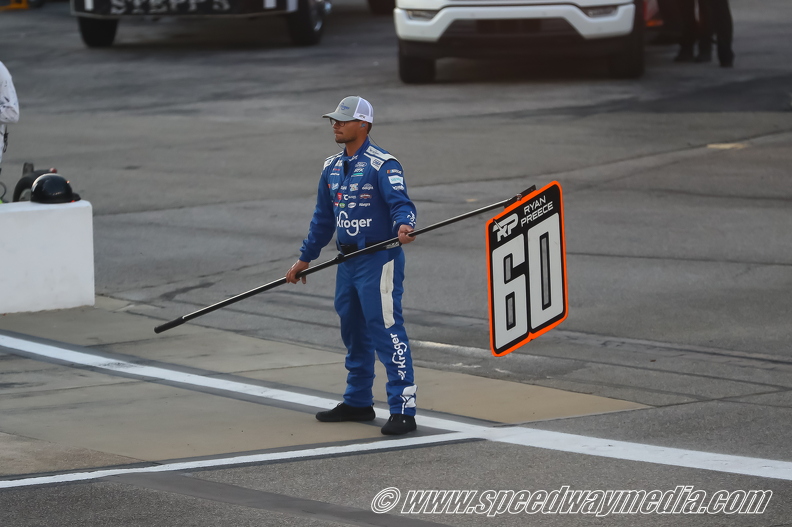 Chris Buescher's crew man during the pit road drive through.jpg
