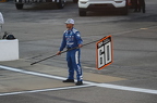 Chris Buescher's crew man during the pit road drive through