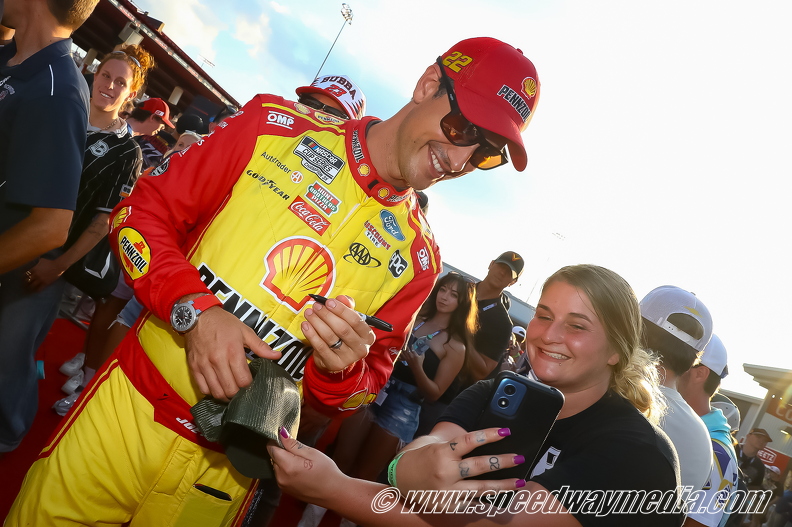 Joey Logano with a fan.jpg