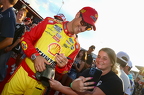 Joey Logano with a fan