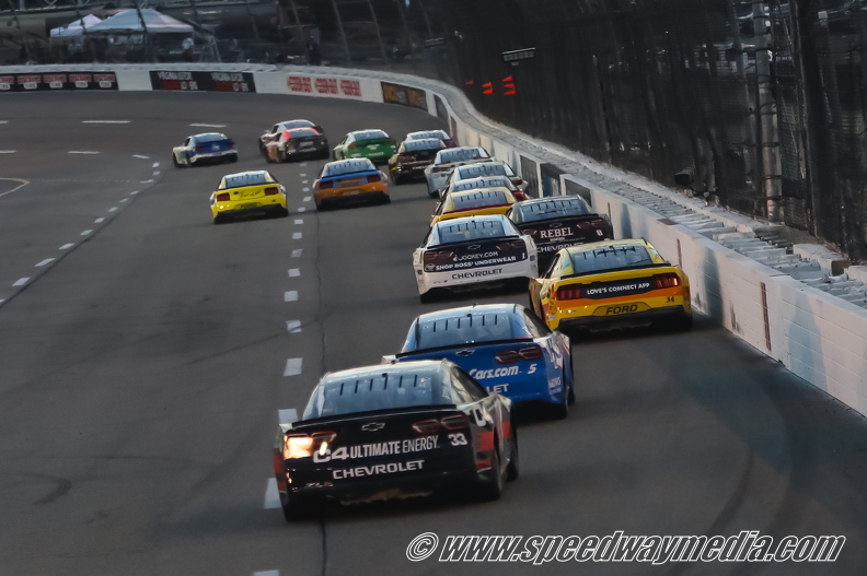The field heading down the backstretch.jpg