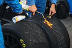 Cleaning tire to measure at Darlington