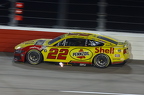 Joey Logano with exhaust flames