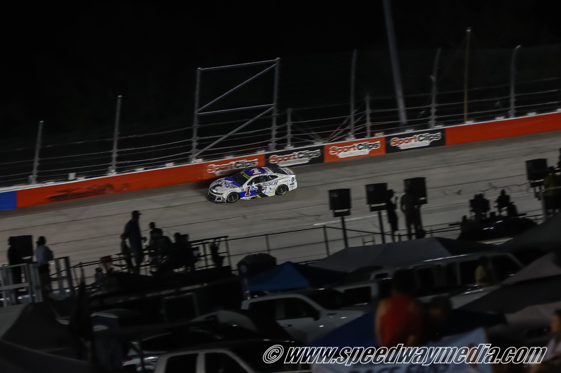 Ross Chastain through  the fans.jpg