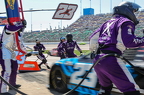 Bubba Wallace crew waitsfor pit stop