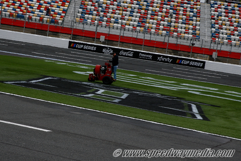 Painting the #8  on thr front stretch grass in honor of Kyle Busch.jpg