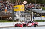 80 Donald Theetge wins race, checker flag