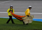 safety crew removes front nose from Caleb Costner crash