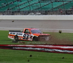 Caleb Costner slide through the grass