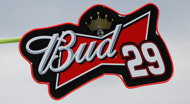 HOORAHS AND WAZZUPS: HEY, HOW DID THAT GUY WITH THE CAN OF BUDWEISER WIND UP IN THE COCA COLA VICTORY LANE?