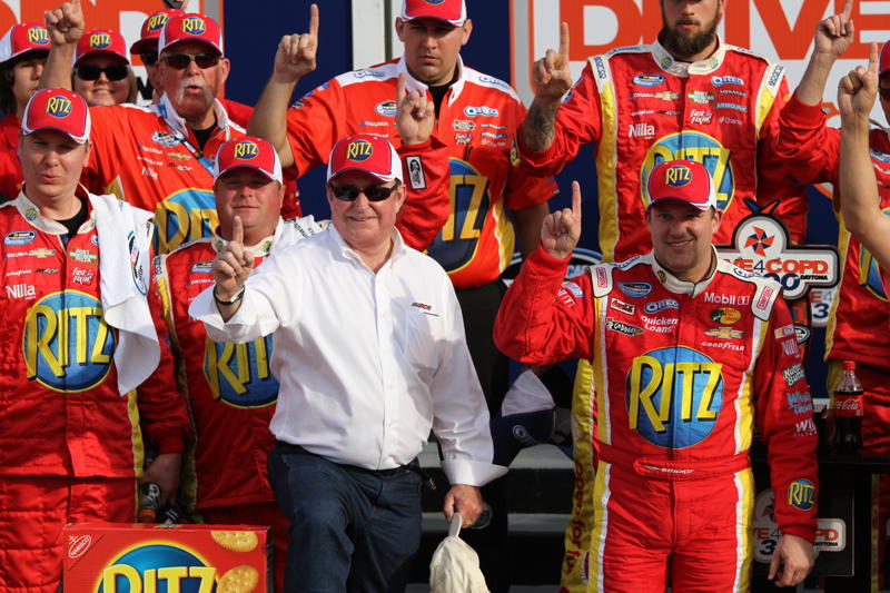 Tony Stewart wins the DRIVE4COPD 300 after last lap wreck