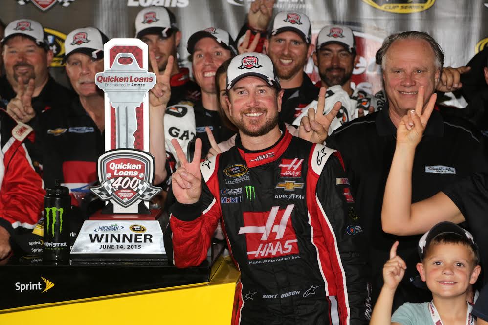 Kurt Busch Uses Late Pass to Win Quicken Loans 400