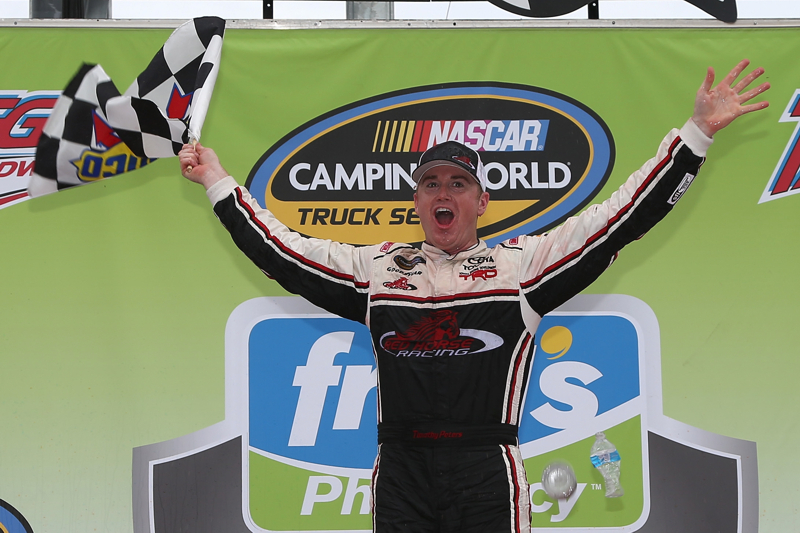 Polesitter Timothy Peters wins action-filled Truck race at Talladega