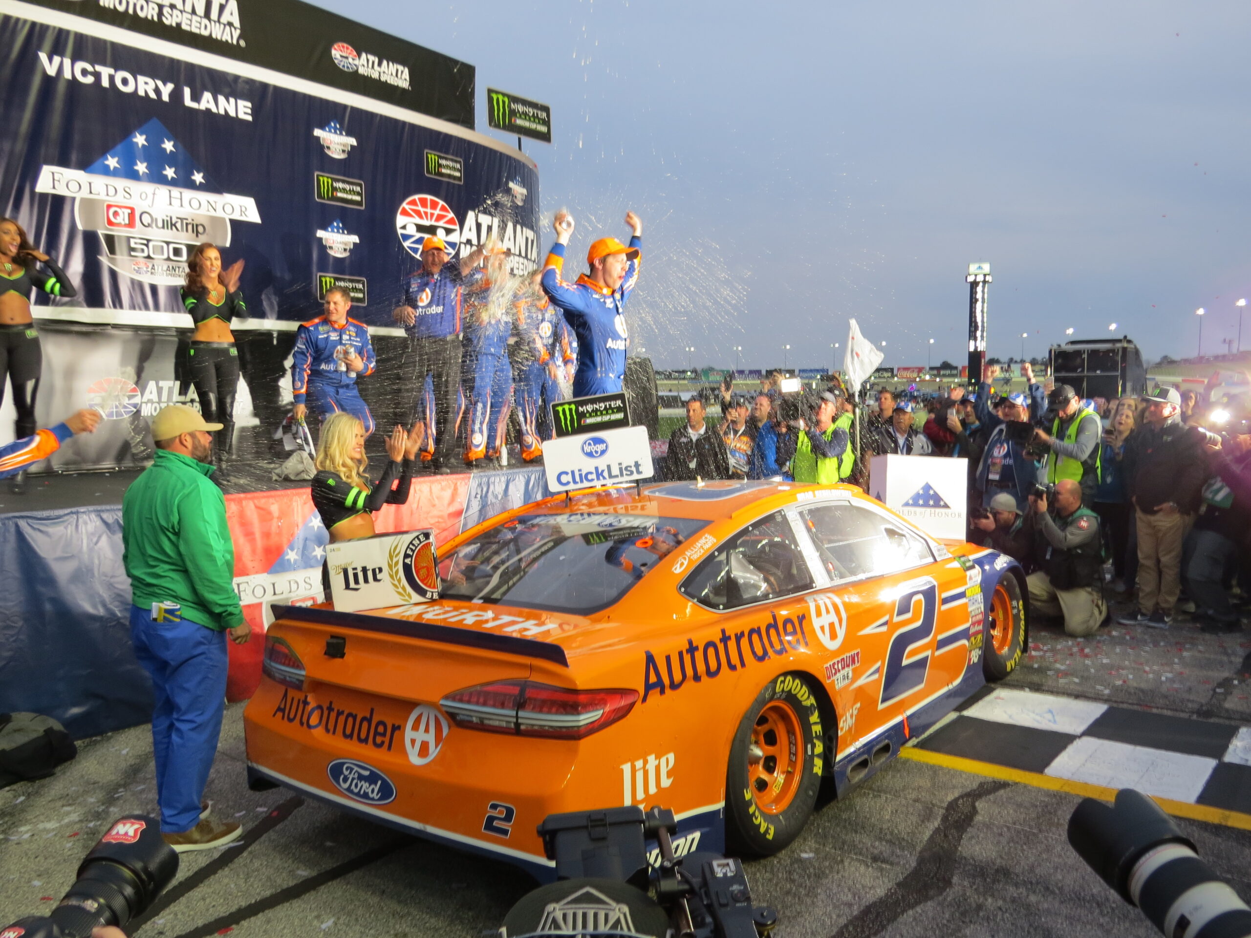 Keselowski steals win on late restart, while Harvick blows it on late penalty