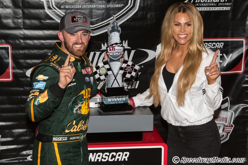 Dillon battles competition and rain to win Xfinity race at Michigan