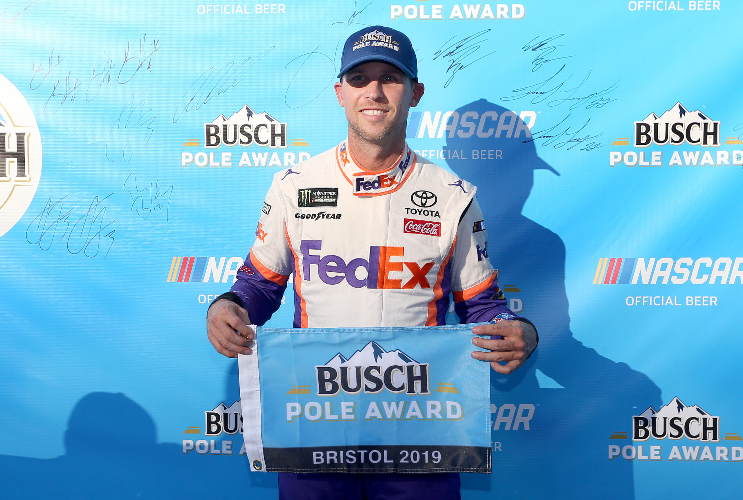 Denny Hamlin wins the Bass Pro Shops NRA Night race pole at Bristol