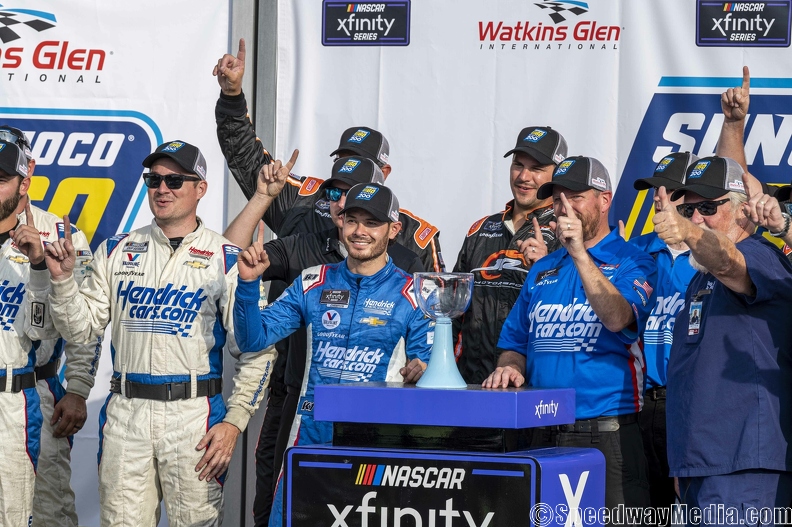 Larson avoids late calamity for Xfinity victory at Watkins Glen