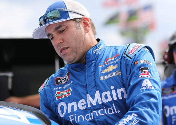 Former NASCAR driver sues Virginia governor