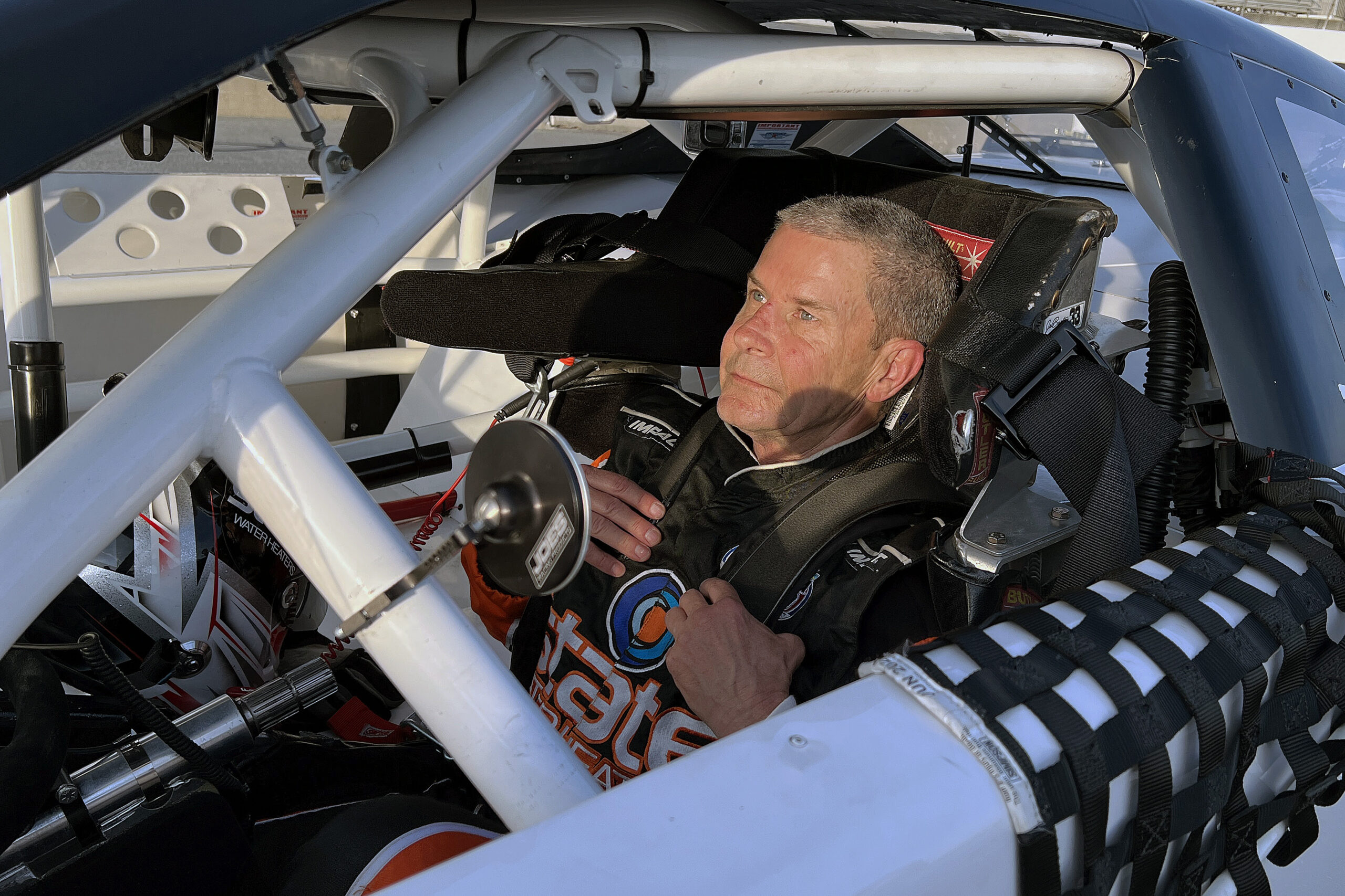 WARD BURTON TAKES A BRIEF TURN BEHIND THE WHEEL OF A LATE MODEL STOCK CAR AT SOUTH BOSTON SPEEDWAY