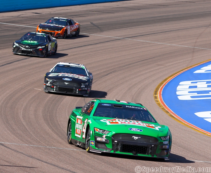 Late caution ruins Harvick’s run to Phoenix victory