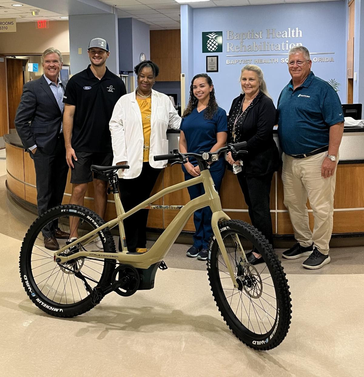 Todd Gilliland and Serial 1 Premium E-Bikes Make Donation to Baptists Health Systems’ Grand Gala