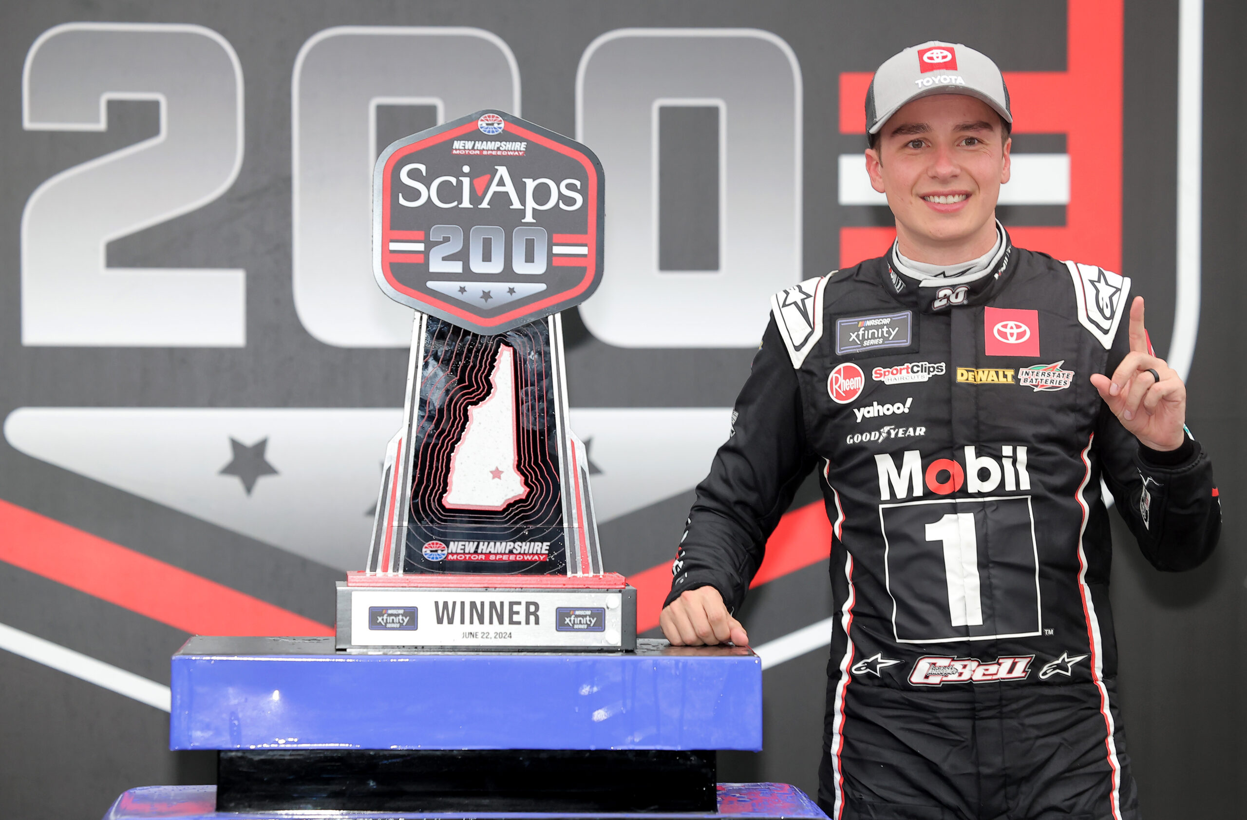 Bell survives overtime shootout for fourth consecutive Xfinity victory at New Hampshire