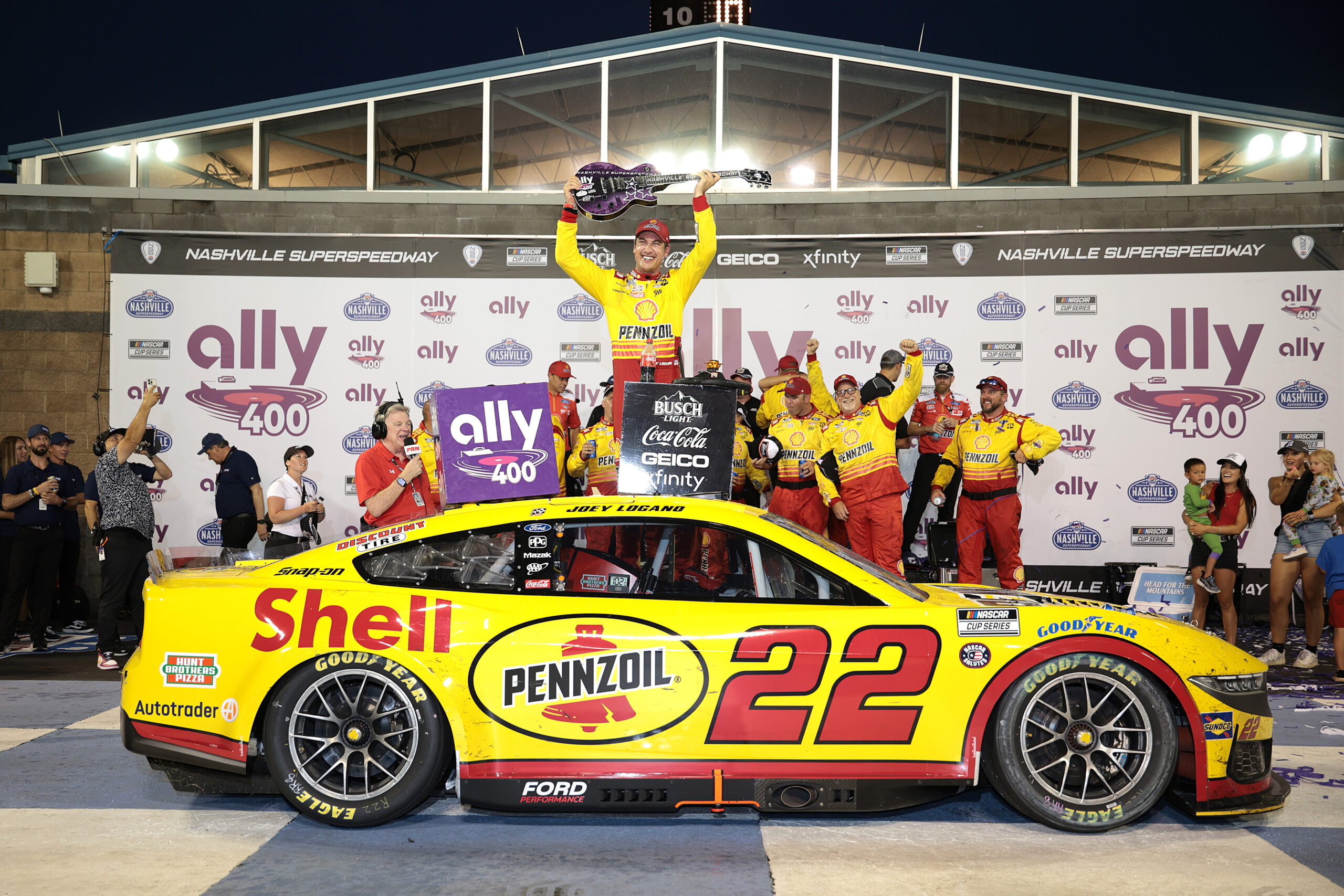 Logano withstands five overtime attempts for fuel-mileage Cup victory at Nashville